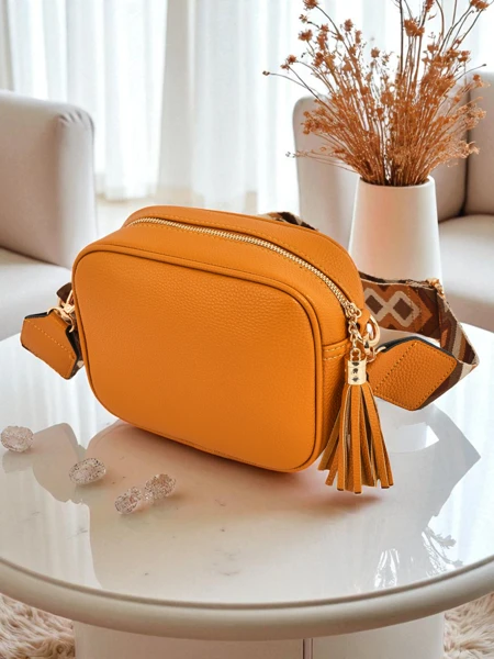 Royalfashion Kis női öko bőr kézitáska színes pánttal Kovi Lace