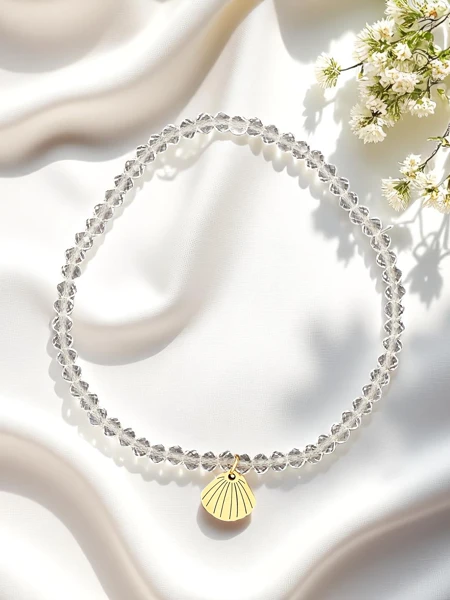 Royalfashion Női karkötő kagyló medállal