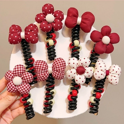 Royalfashion Hajgumi spirál formában, kis virággal – Blossom Coil