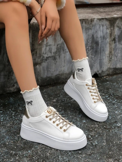 Royalfashion Női sportos sneaker dekoratív fűzővel Eone