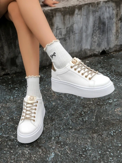 Royalfashion Női sportos sneaker dekoratív fűzővel Eone