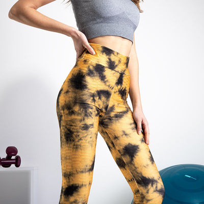 Sárga női nadrág dekoratív foltokkal - Ruházat