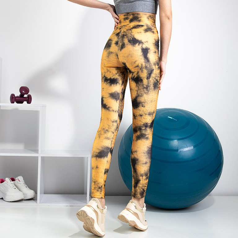 Sárga női nadrág dekoratív foltokkal - Ruházat