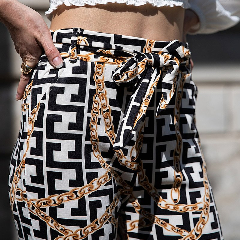 Fekete női nadrág nyomtatással - Ruházat