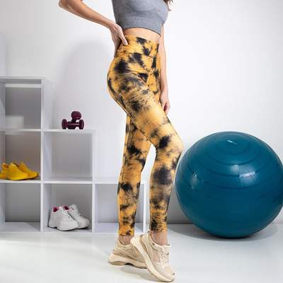 Sárga női nadrág dekoratív foltokkal - Ruházat