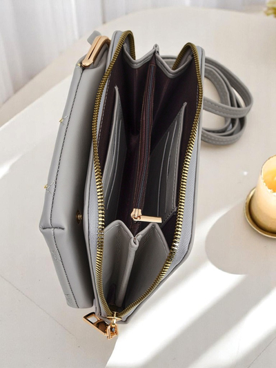 Royalfashion Multifunkciós kézitáska-pénztárca pánttal Office Charm