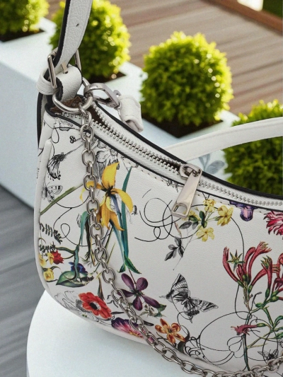 Royalfashion Kis női kézitáska ökobőrből, virágos mintával Lily Bloom