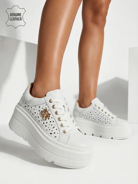 Ażurowe sportowe sneakersy damskie ze skóry naturalnej Atelle