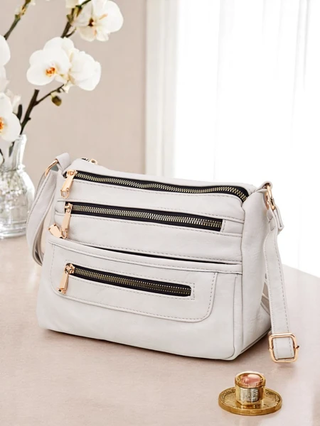 Royalfashion Kisméretű, négyzet alakú kézitáska ökobőrből Niva Time