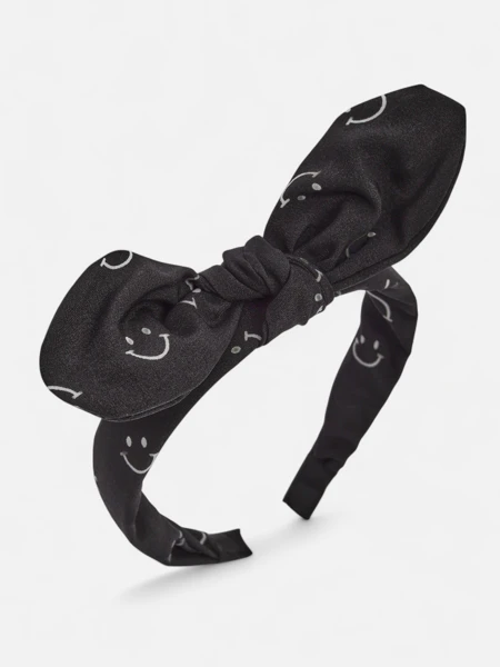 Royalfashion Gyermek hajpánt mosolygós arcokkal díszített masnival