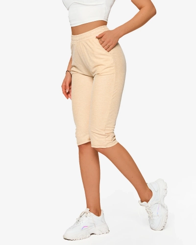 Női 3/4 hosszú szövetnadrág bézs színben PLUS SIZE- Ruházat