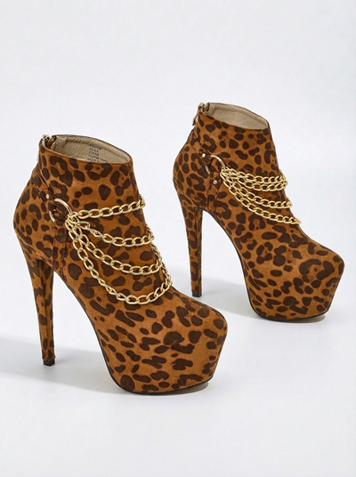 Royalfashion Dámszárú bokacsizma tűsarkúval Damesse