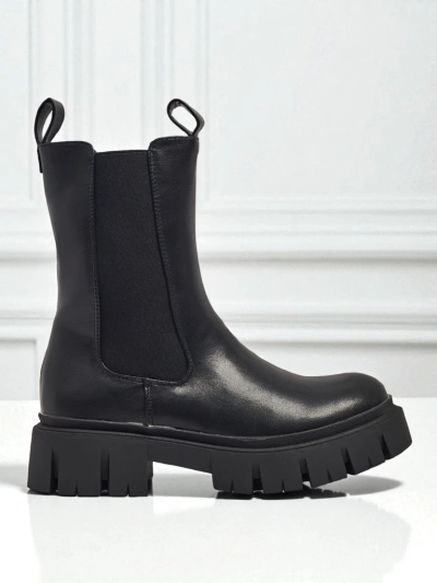 Magas szárú női öko bőr bokacsizma Dorvella