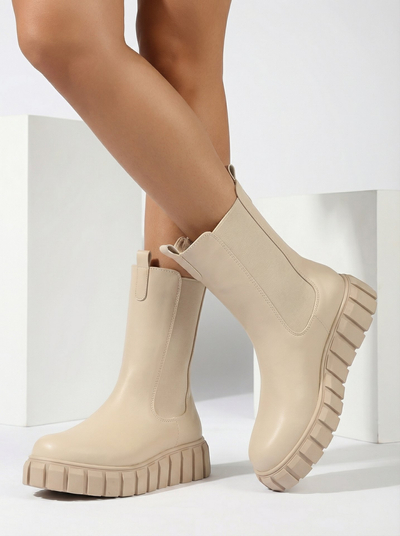 Royalfashion Női magas, lapos sarkú csizma ekrü színben Elicane