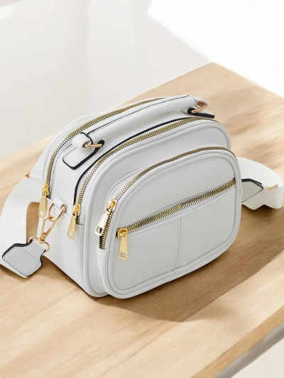 Royalfashion ovális kis női táska öko-bőrből