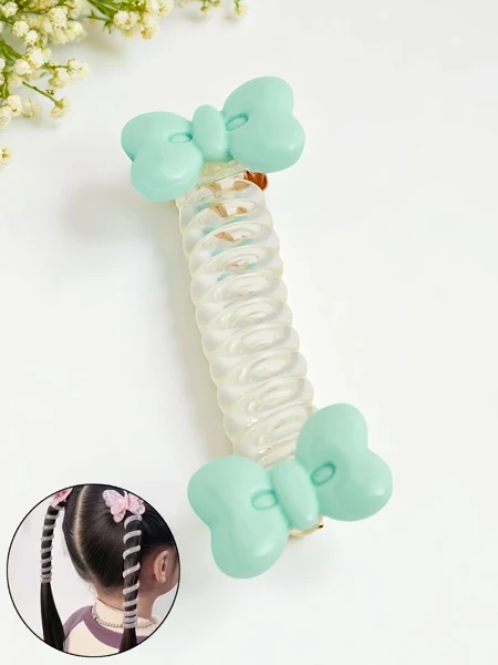 Royalfashion Hajgumi spirál formájában masnival Bow Twist