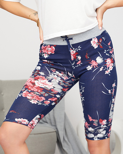 Mintás 3/4-es női rövidnadrág sötétkék és rózsaszín színben. Molett méretű ruházati cikkek