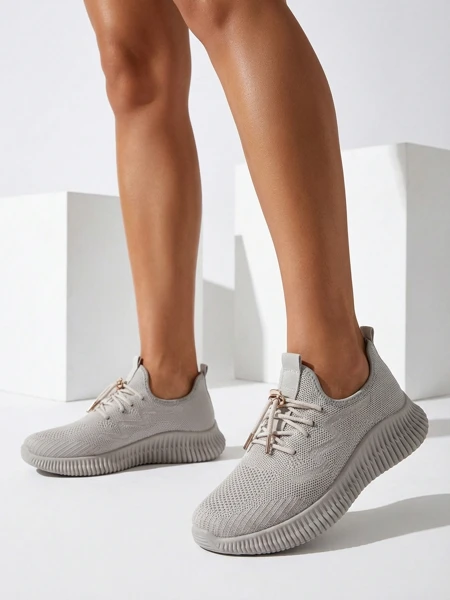 Aurelia Beige Royalfashion – Bézs női fűzős szövet tornacipő