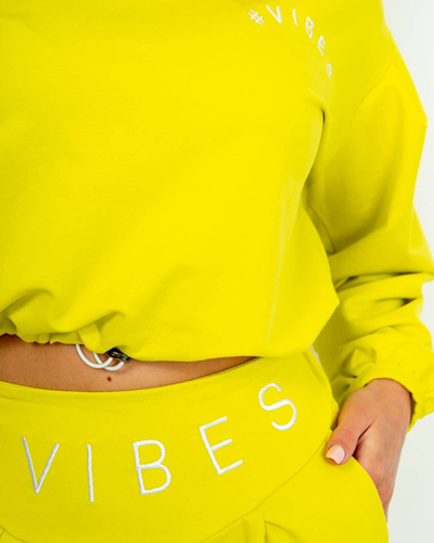 Sárga női sporttréningruha szett crop top pulóverrel - Ruházat