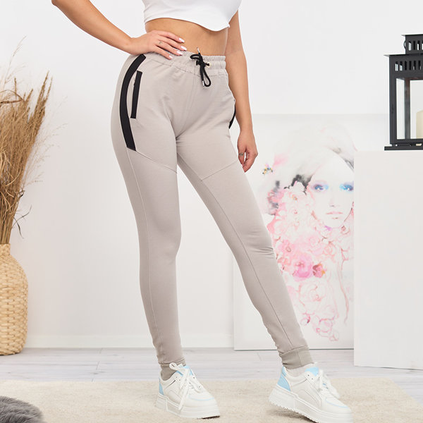 Női világosszürke melegítőnadrág betétekkel- Ruházat