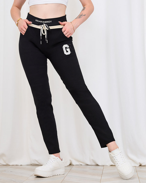 Royalfahion Női fekete sportos stílusú nadrág foltokkal PLUS SIZE