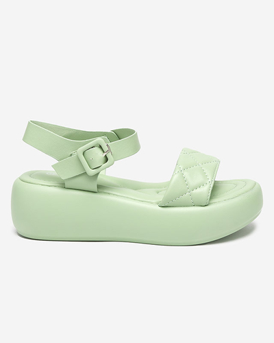 OUTLET Női öko-bőr steppelt ékszandál zöld Baloui színben. Cipő