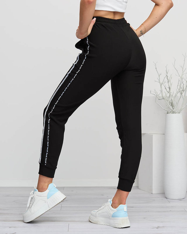 Női fekete cargo nadrág csíkokkal - Ruházat