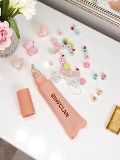 Ajakfény karkötővel Gloss & Charm Cocoa Cookie