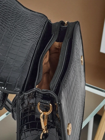 Lakkozott kis női műbőr táska Veluna