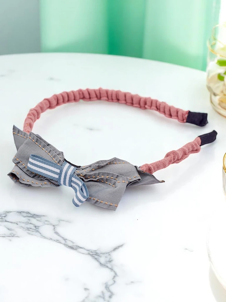 Royalfashion Gyerek fejpánt masnival Sweet Bow