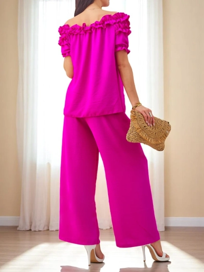 Royalfashion Női szett vállnélküli, rövid ujjú blúzzal díszes dekoltázzsal és bőszárú nadrággal