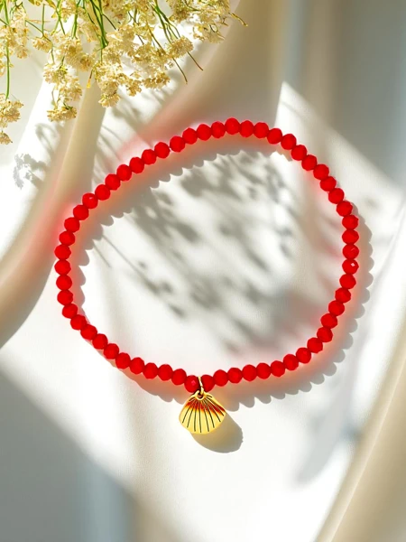 Royalfashion Női karkötő kagyló medállal