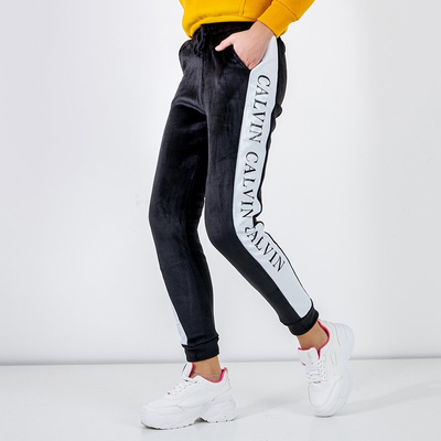 Női fekete szigetelt csíkos tréningnadrág - Ruházat