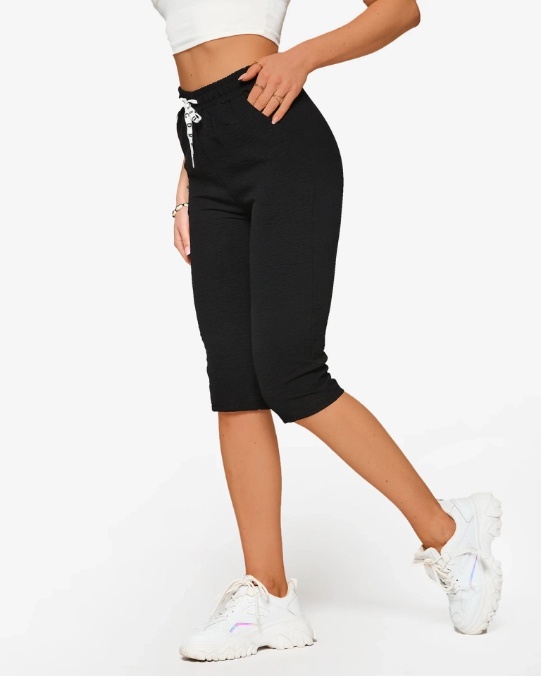 Női fekete szövetnadrág 3/4- Ruházat