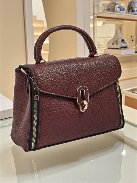 Celoura kisméretű női műbőr kézitáska