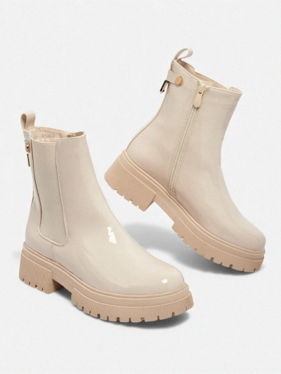 Lakkozott női eco bőr Calebi bokacsizma