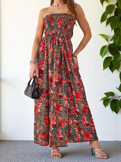 Royalfashion Mintás női midi ruha ujj nélkül, széles gumival és hasítékokkal az alján