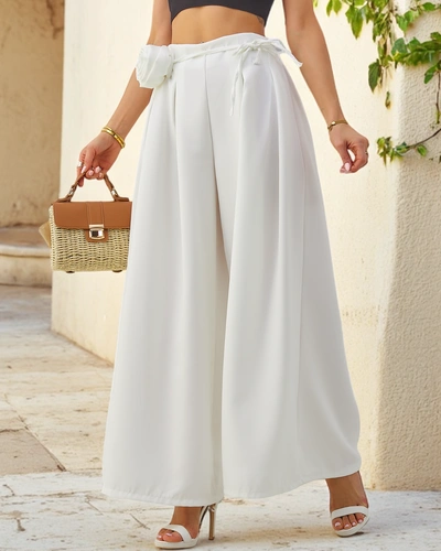 Royalfashion Elegáns, széles női nadrág díszes virággal az övön