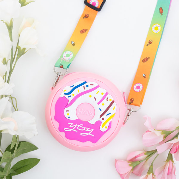 Rózsaszín kézitáska fánkkal - Táskák