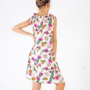 Beżowa sukienka w kwiaty - Odzież
